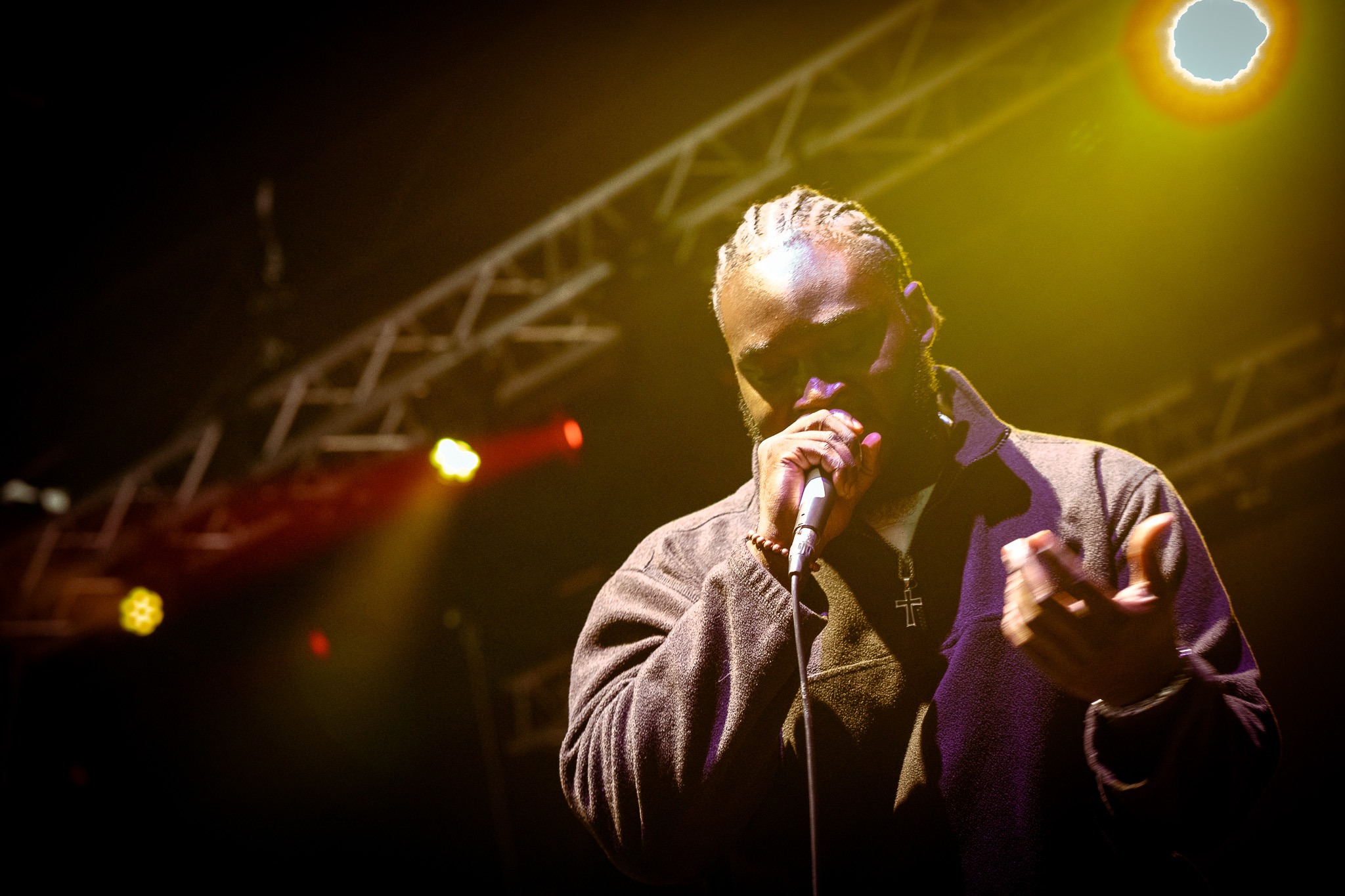 Live performer in warm yellow light